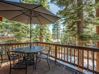 Enjoy the serene mountain views from this charming balcony, perfect for outdoor dining or morning coffee.