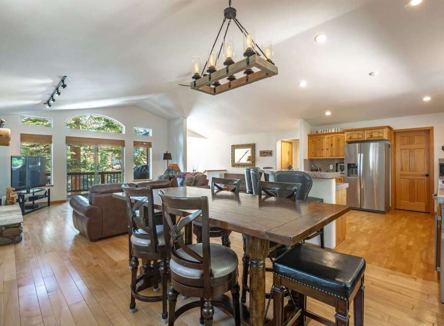 Experience the perfect blend of rustic charm and modern comfort in this spacious open-concept living area.