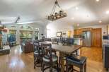 Experience the perfect blend of rustic charm and modern comfort in this spacious open-concept living area.