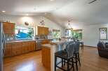 Experience the perfect blend of rustic charm and modern convenience in this spacious kitchen.