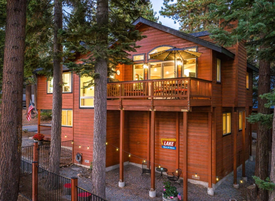 Experience the ultimate mountain getaway in this stunning wooden home, nestled amongst towering pine trees.