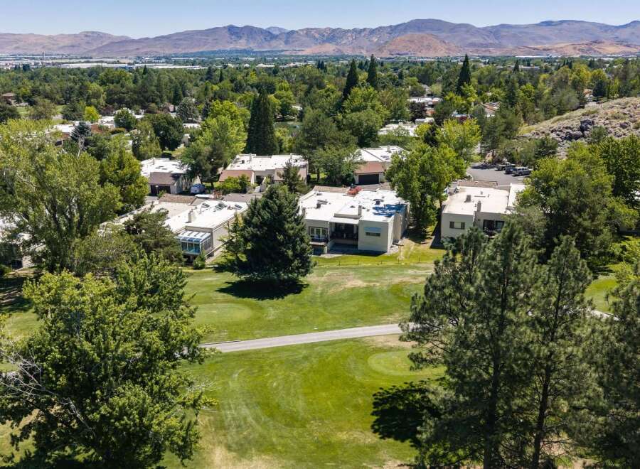 Experience luxury living in this stunning property, nestled amidst lush greenery and a picturesque golf course.