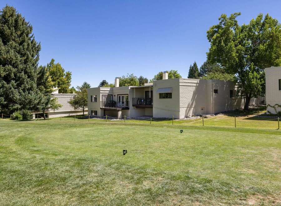 Enjoy stunning golf course views from this property, featuring a spacious backyard perfect for outdoor entertaining.
