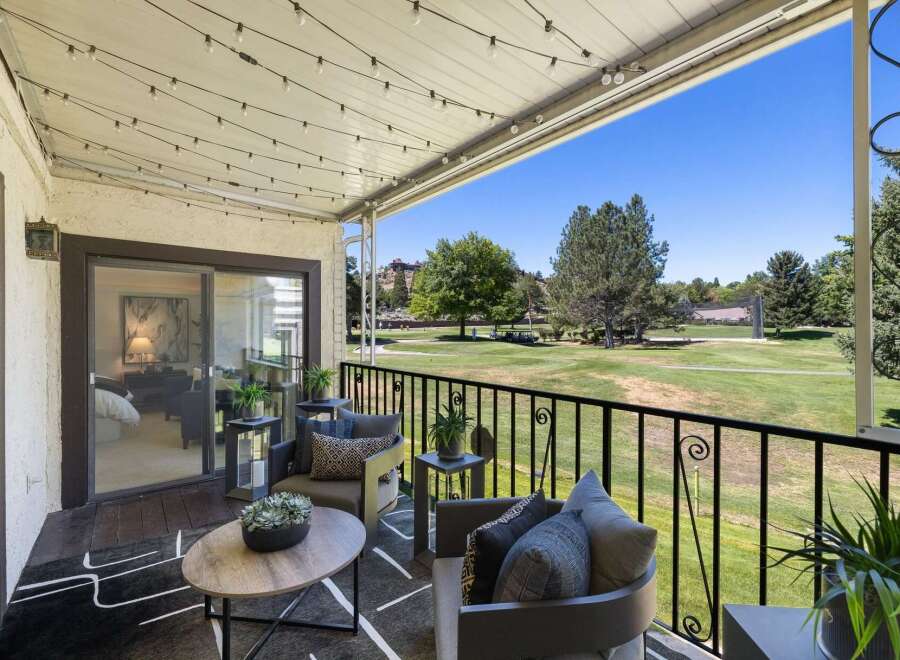 Enjoy breathtaking golf course views from this charming balcony, perfect for morning coffee or evening relaxation.