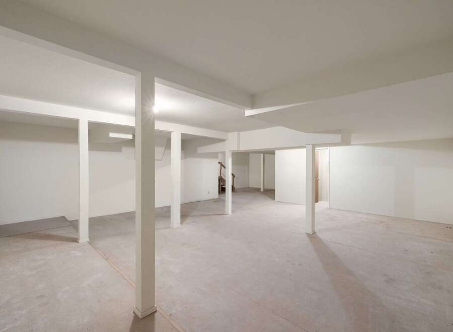 Discover the potential of this unfinished basement, offering a blank canvas for your dream living space.