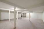 Discover the potential of this unfinished basement, offering a blank canvas for your dream living space.
