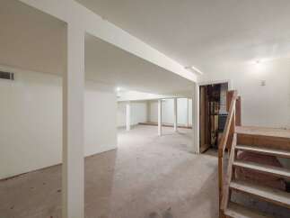 Explore the potential of this unfinished basement, offering a blank canvas for your dream living space.