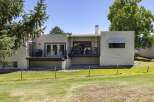 Enjoy outdoor living on the spacious decks of this beautiful home, perfect for entertaining or relaxing.