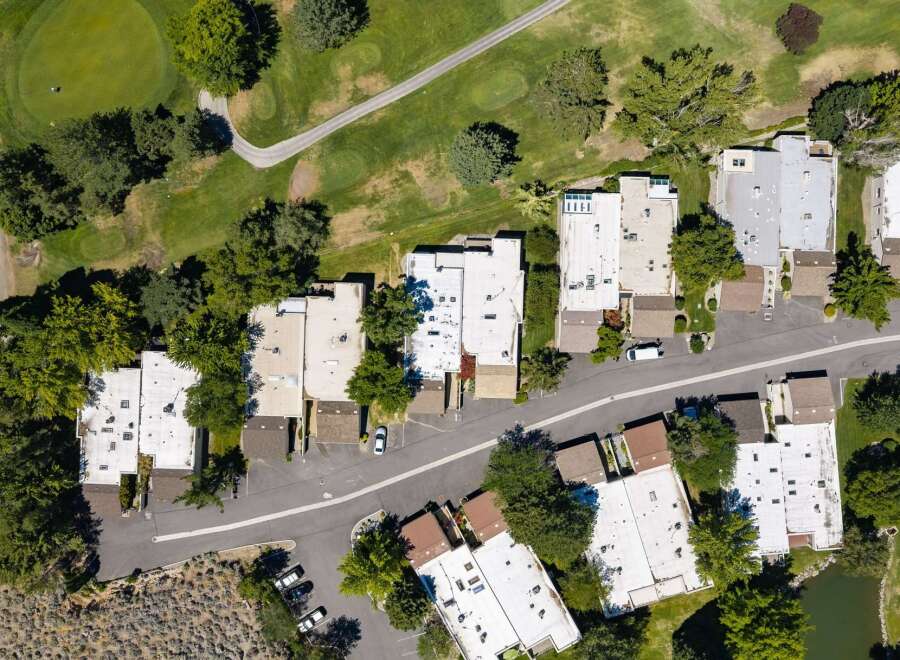 Discover luxury living adjacent to a pristine golf course, offering a unique blend of recreational access and serene residential comfort.