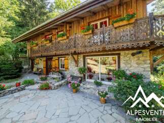 Experience the charm of this traditional wooden chalet nestled in a serene natural setting.