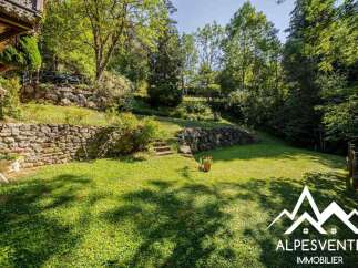 Discover this charming property nestled in a lush green setting, perfect for those seeking tranquility and nature.