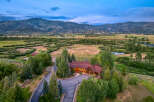 Experience luxury living in this stunning mountain estate, nestled amidst breathtaking natural beauty.