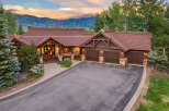 Experience luxury mountain living in this stunning custom-built home, perfectly situated to capture breathtaking sunset views.