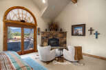 Experience rustic charm and breathtaking mountain views from this inviting living space.