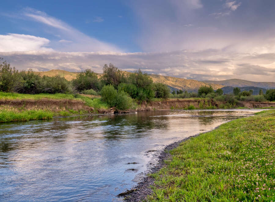Experience the tranquility of this stunning riverside property, perfect for those seeking a peaceful retreat.