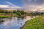 Experience the tranquility of this stunning riverside property, perfect for those seeking a peaceful retreat.