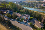 Experience luxury living in this stunning modern home, boasting solar panels for eco-friendly energy and a prime location with breathtaking river views.