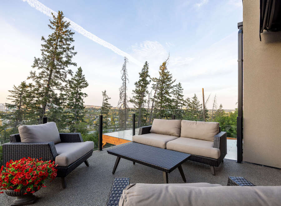 Enjoy breathtaking views from this stunning patio, perfect for entertaining or relaxing.