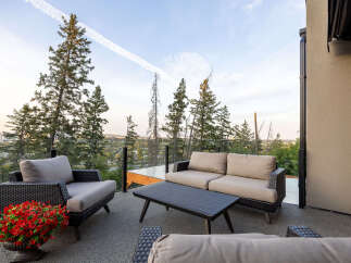 Enjoy breathtaking views from this stunning patio, perfect for entertaining or relaxing.