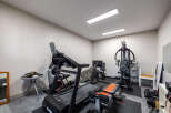 Transform your home into a personal fitness sanctuary with this fully equipped home gym.
