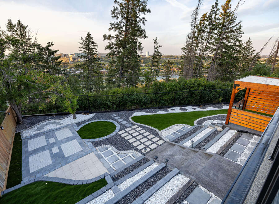 Experience breathtaking panoramic views from this stunning property, featuring a meticulously designed modern landscape.