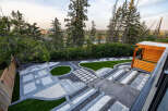 Experience breathtaking panoramic views from this stunning property, featuring a meticulously designed modern landscape.