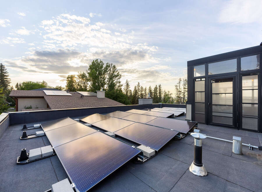 Experience sustainable living with this modern home featuring a state-of-the-art rooftop solar panel system, maximizing energy efficiency and reducing utility costs.