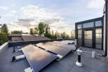 Experience sustainable living with this modern home featuring a state-of-the-art rooftop solar panel system, maximizing energy efficiency and reducing utility costs.