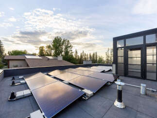 Experience sustainable living with this modern home featuring a state-of-the-art rooftop solar panel system, maximizing energy efficiency and reducing utility costs.