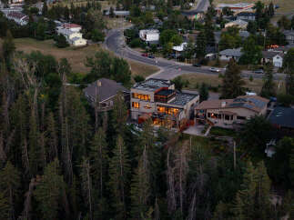 Nestled amidst a lush forest, this modern architectural gem offers unparalleled luxury and privacy.