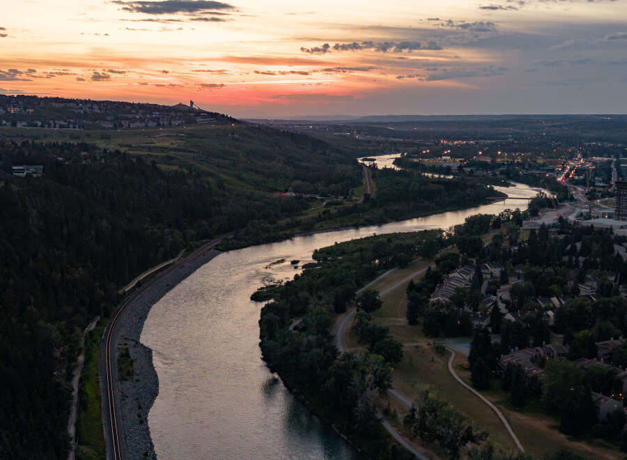 Experience breathtaking sunset views from this stunning property, perfectly situated along the serene riverbank.