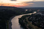 Experience breathtaking sunset views from this stunning property, perfectly situated along the serene riverbank.