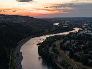 Experience breathtaking sunset views from this stunning property, perfectly situated along the serene riverbank.