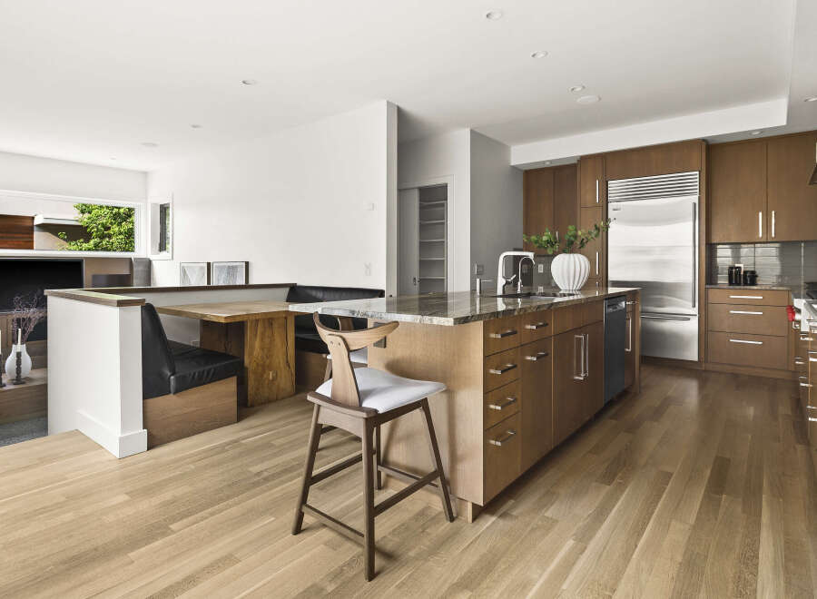 Experience modern living in this stunning open-concept kitchen and dining area.