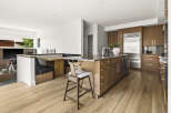 Experience modern living in this stunning open-concept kitchen and dining area.