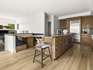 Experience modern living in this stunning open-concept kitchen and dining area.