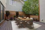Enjoy al fresco dining on this spacious deck, perfect for entertaining.