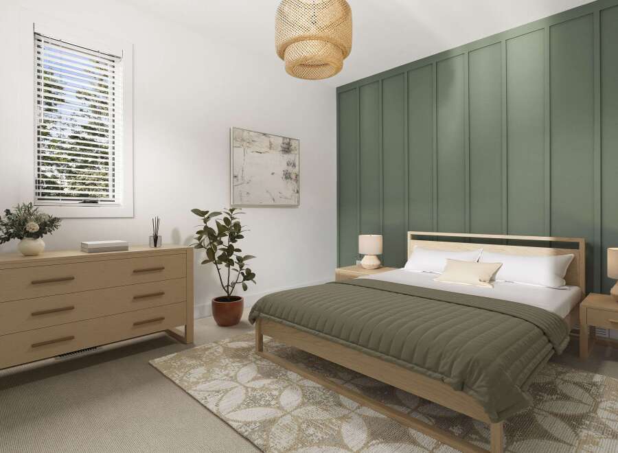 Experience serene living in this beautifully appointed bedroom, featuring a calming sage green accent wall and a natural wood platform bed.