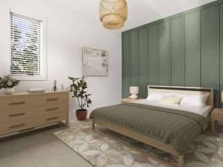 Experience serene living in this beautifully appointed bedroom, featuring a calming sage green accent wall and a natural wood platform bed.