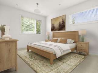 This beautifully staged bedroom features a warm, natural wood bed frame and matching nightstands, creating a cozy and inviting atmosphere.