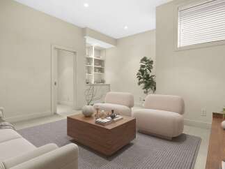 Step into this inviting living space, featuring a plush sectional sofa and two comfortable armchairs perfect for relaxation.