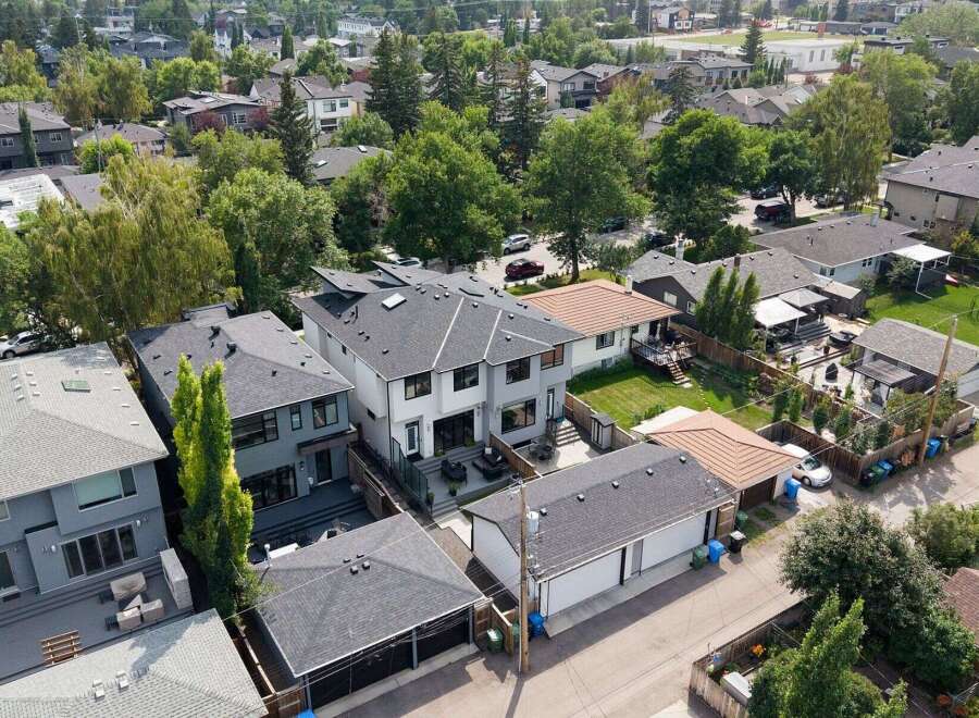 Discover modern living in this stunning multi-level home, featuring a sleek architectural design and expansive windows that flood the interior with natural light.