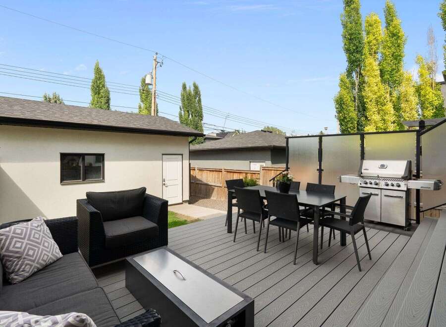Enjoy outdoor living at its finest on this spacious deck, perfect for entertaining.