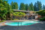 Enjoy outdoor living with this stunning property featuring a sparkling swimming pool perfect for hot summer days.