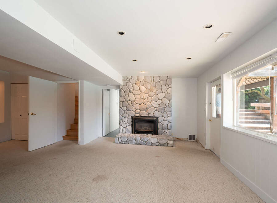 Discover this inviting basement living space, perfect for relaxation and entertainment.