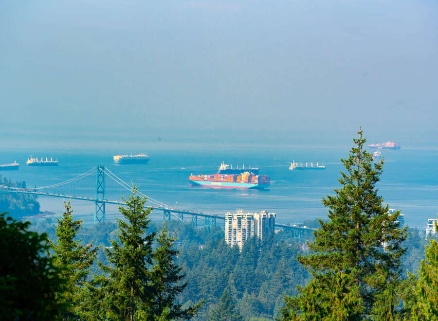 Experience breathtaking panoramic views from this prime real estate location, overlooking the Lions Gate Bridge and the bustling Vancouver harbor.