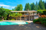 Escape to this stunning home featuring a sparkling swimming pool, perfect for hot summer days.