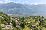 Nestled amidst rolling green hills and offering breathtaking panoramic views of the majestic mountains and valley below, this charming property presents an idyllic retreat.