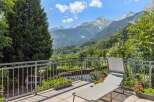 Enjoy breathtaking mountain views from this stunning balcony, perfect for relaxation and outdoor living.