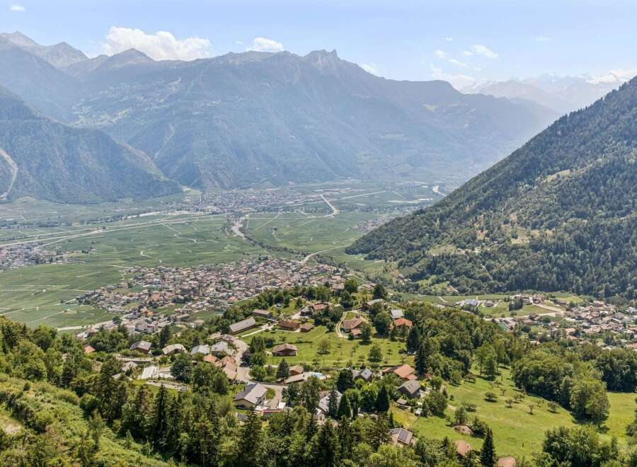 Experience breathtaking panoramic views from this stunning property nestled in the Swiss Alps.